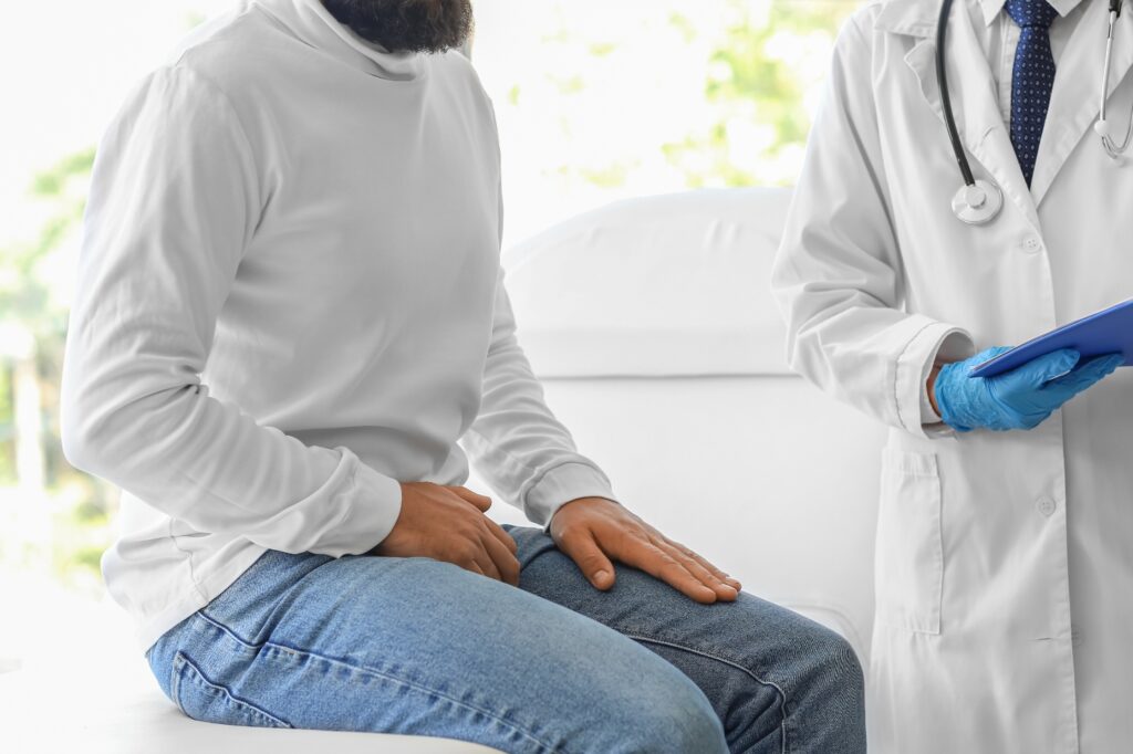 man med problem i bäcken