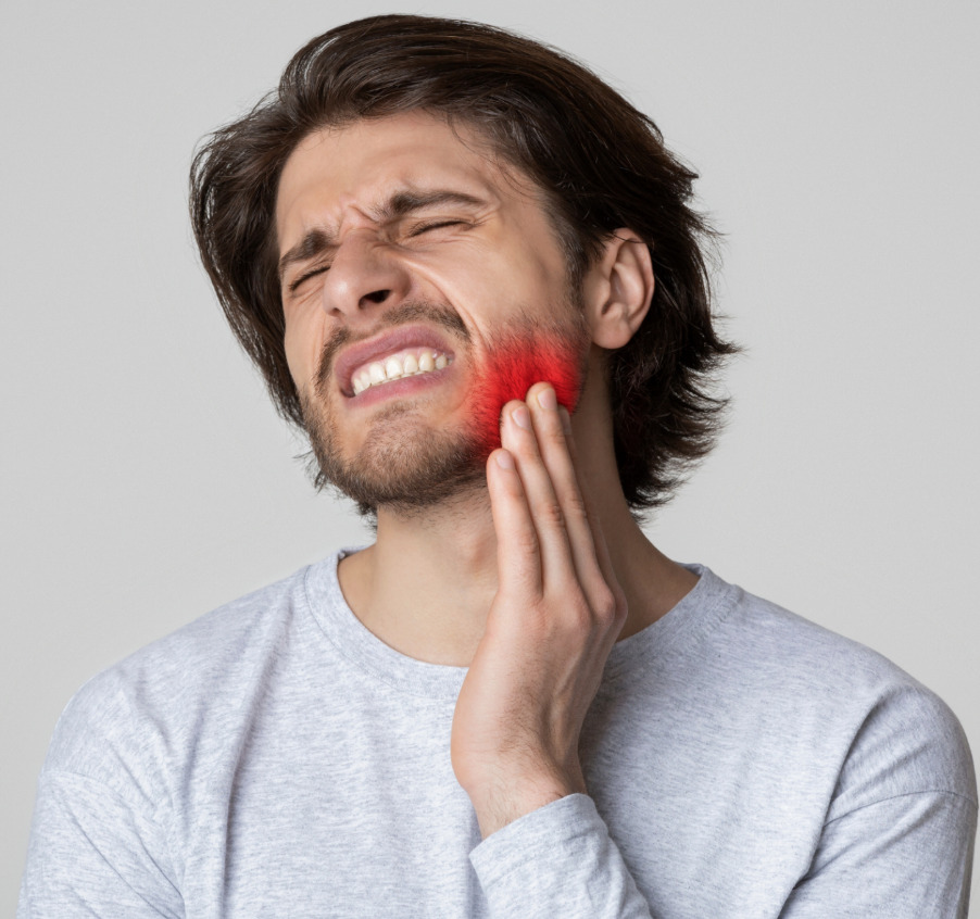 man med ont i käken